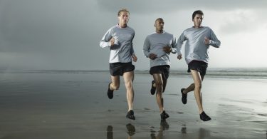 Runners on beach