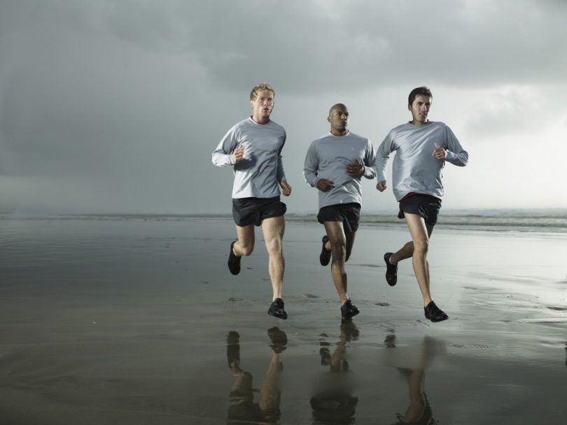 Runners on beach