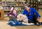 Paws to Read, a reading assistance program offered at libraries around the Peninsula, allows children ranging from just a few years old to the early teens to read to dogs to enhance their skills.